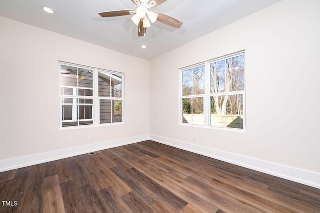 empty room featuring ceiling fan and wood-type flooring