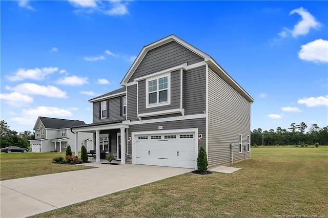 view of front of house featuring a garage and a front yard