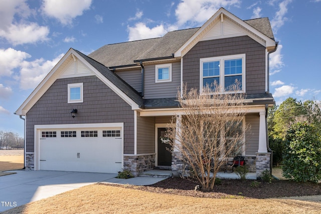 craftsman-style home with a garage and a porch