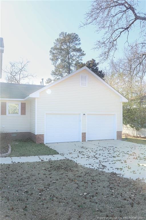 view of home's exterior with a garage