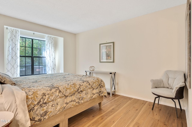 bedroom featuring light hardwood / wood-style floors