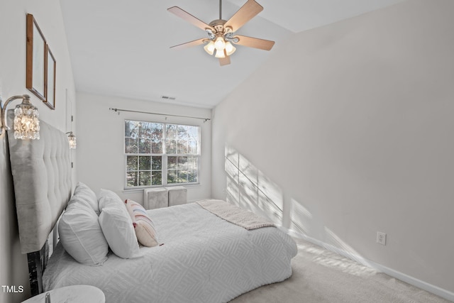 bedroom with carpet flooring, ceiling fan, and lofted ceiling