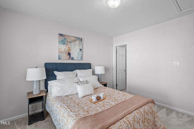 bedroom featuring light colored carpet