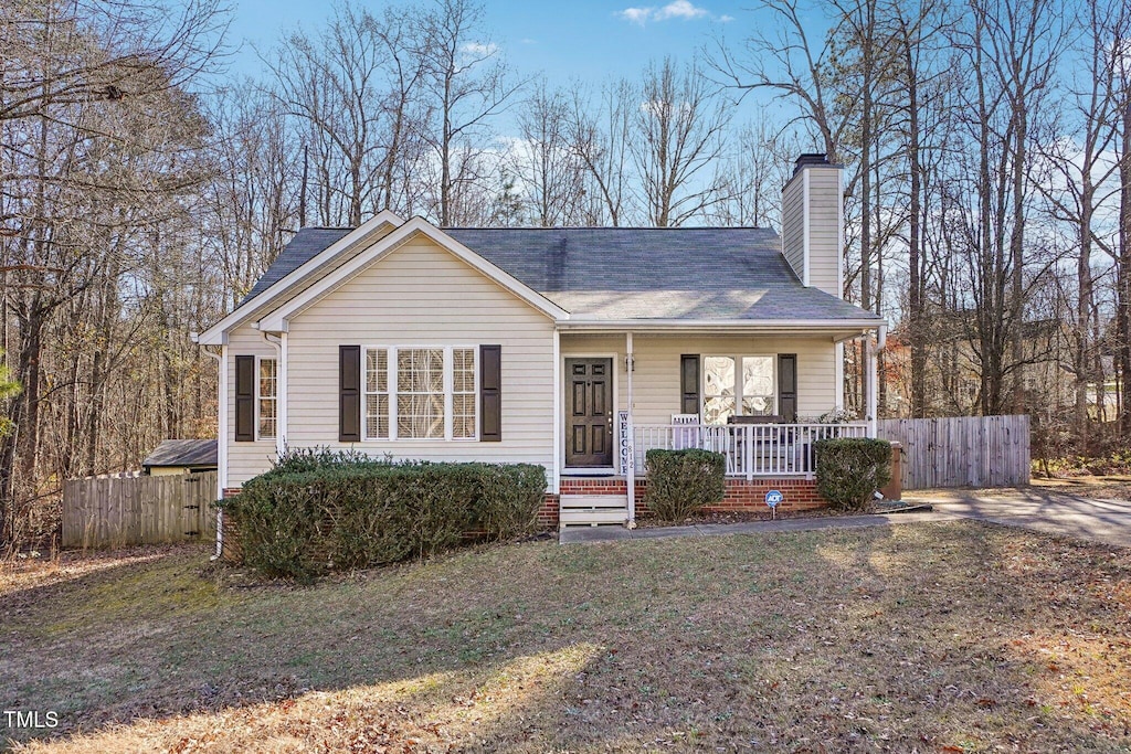 single story home with covered porch