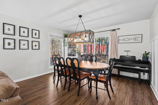 dining area featuring dark hardwood / wood-style flooring