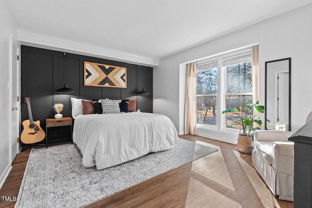 bedroom featuring wood-type flooring