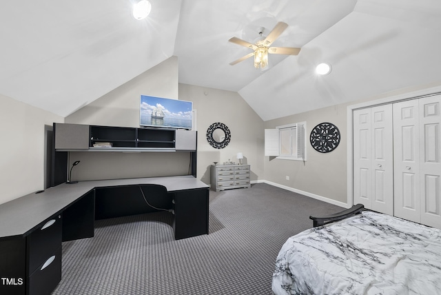 bedroom featuring ceiling fan, lofted ceiling, built in desk, a closet, and dark carpet