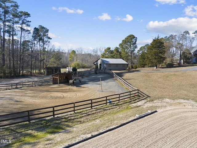 view of yard with a rural view