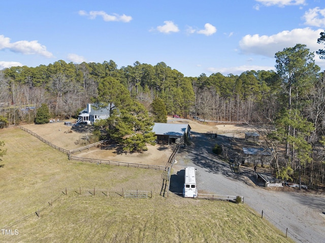 birds eye view of property featuring a rural view