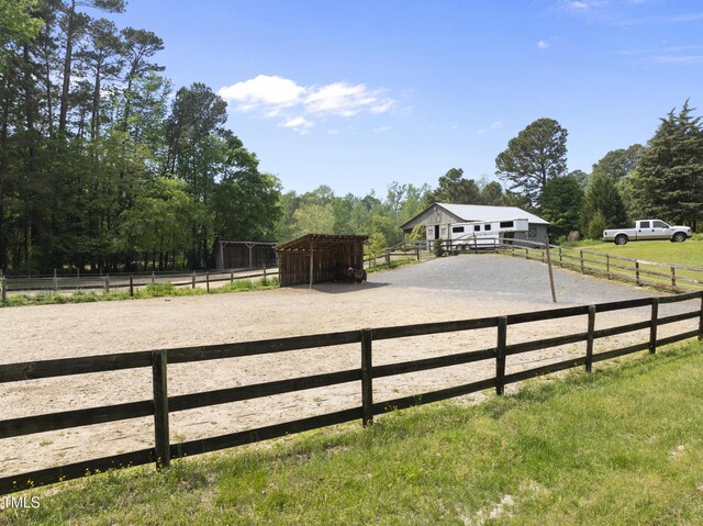 265 Verde Rd, Apex, NC 27523 - view of yard featuring an outdoor riding arena, dirt driveway, and a view of rural / pastoral area