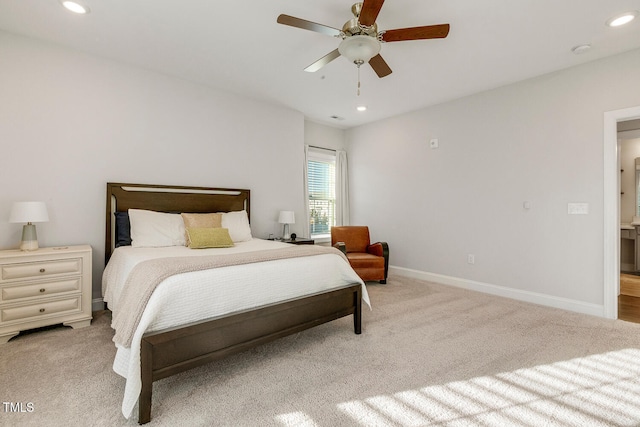 bedroom featuring ceiling fan and light colored carpet