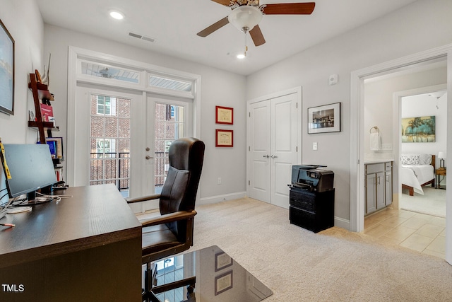 office featuring ceiling fan, french doors, and light colored carpet