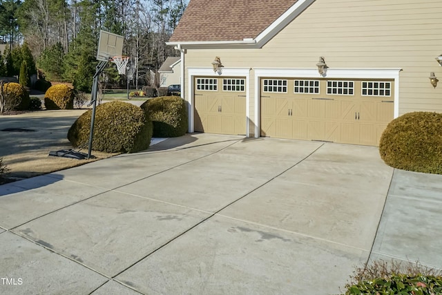 view of side of home with a garage