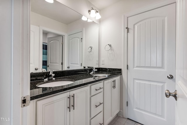 bathroom featuring vanity and tile patterned floors