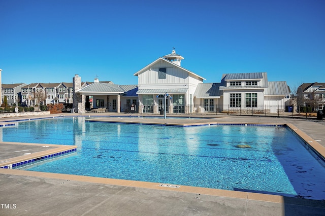 view of swimming pool featuring a patio area