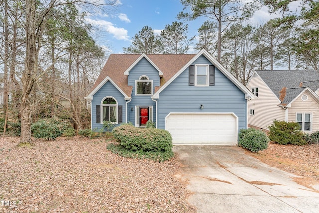 view of front of property with a garage