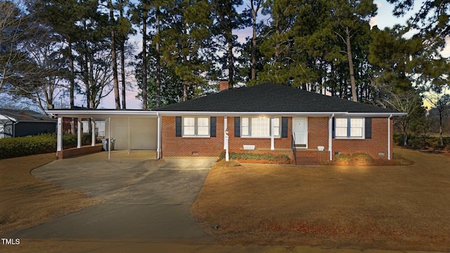 ranch-style house with a carport