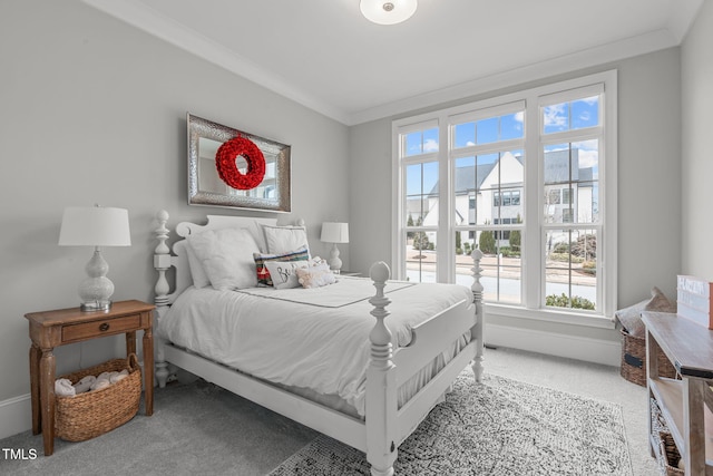 carpeted bedroom with crown molding