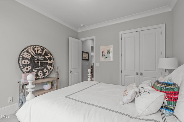 carpeted bedroom featuring a closet and crown molding