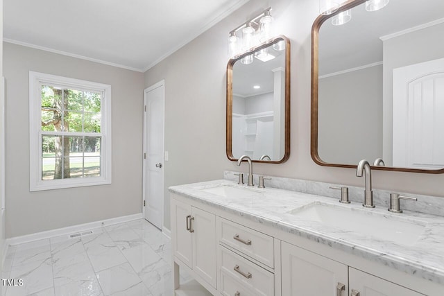 bathroom featuring vanity and ornamental molding