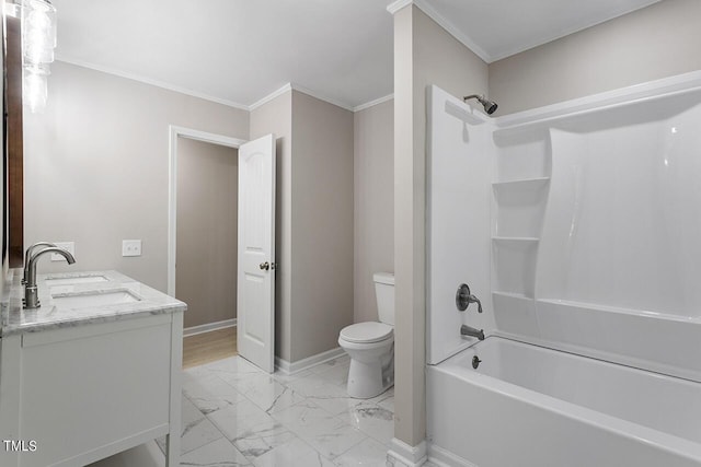 full bathroom with shower / bathing tub combination, crown molding, vanity, and toilet