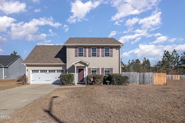 colonial home with a garage