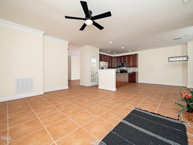 unfurnished living room with ceiling fan, ornamental molding, and light tile patterned floors