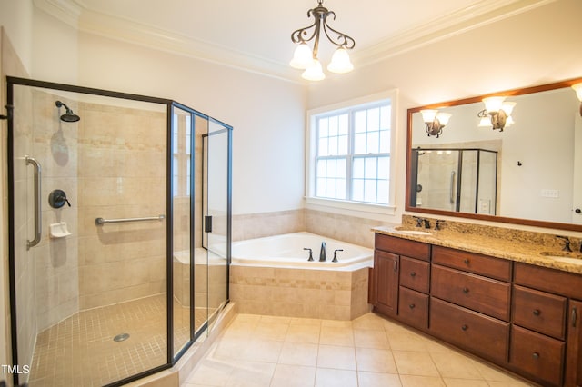 bathroom with tile patterned flooring, ornamental molding, and a sink