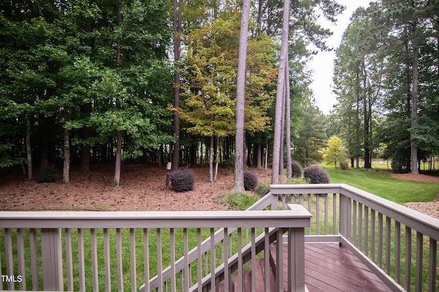 deck featuring a lawn