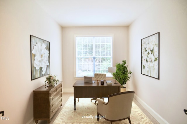 office space featuring baseboards