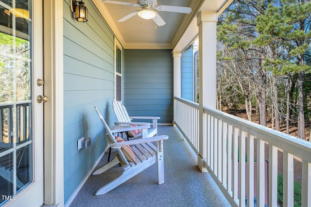 balcony featuring ceiling fan