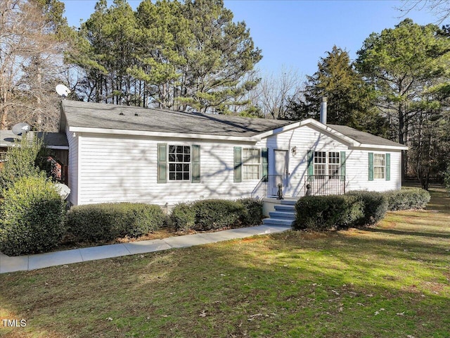 single story home with a front yard