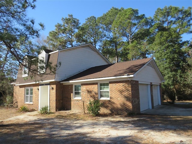 exterior space featuring a garage