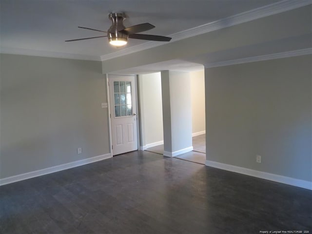 unfurnished room featuring ceiling fan and ornamental molding