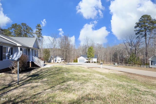 view of yard with a garage