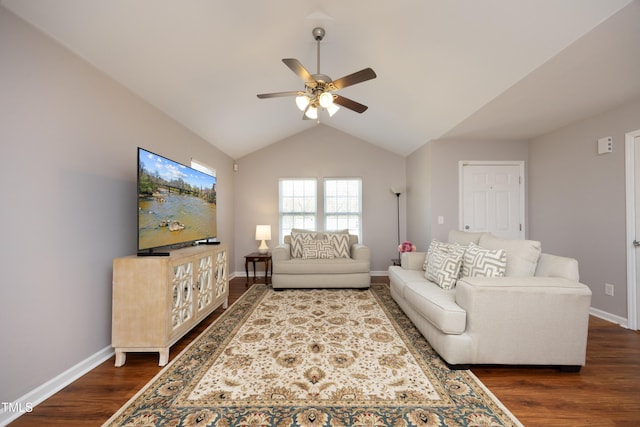 living room featuring vaulted ceiling, ceiling fan, and dark hardwood / wood-style floors