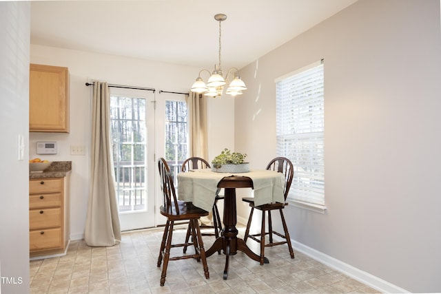 dining room with a chandelier