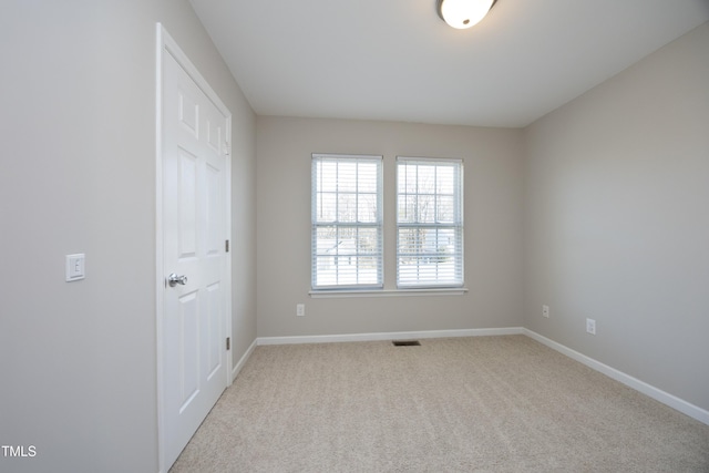 view of carpeted spare room