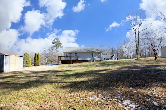 view of yard featuring a wooden deck