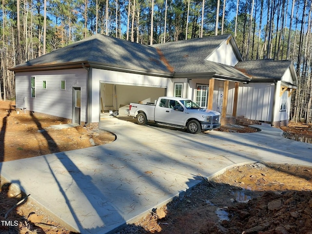 view of side of property with a garage