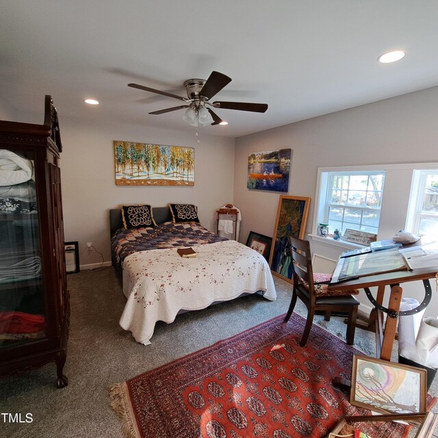 carpeted bedroom with ceiling fan