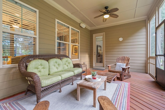 sunroom / solarium with ceiling fan