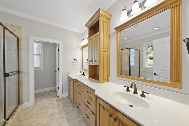 bathroom featuring crown molding, tile patterned flooring, vanity, and a shower with shower door