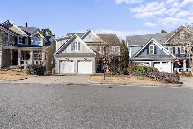 view of front of home with a porch and a garage