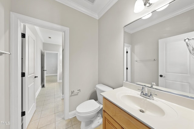 bathroom with tile patterned floors, crown molding, vanity, and toilet