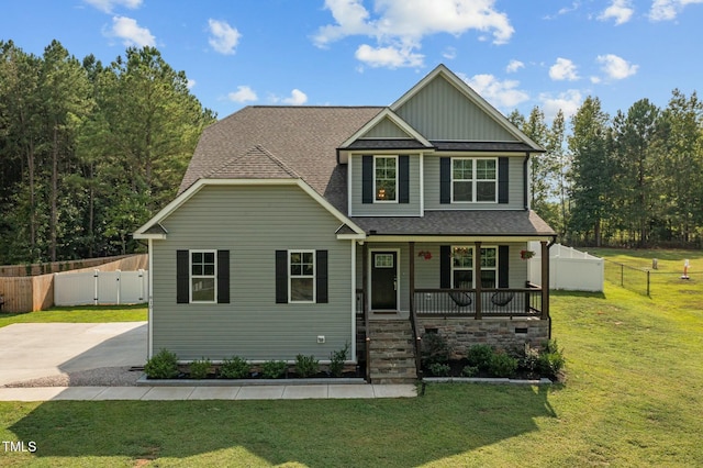 craftsman house featuring a porch and a front yard