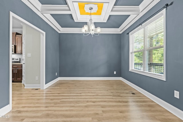 unfurnished room with coffered ceiling, ornamental molding, beam ceiling, a notable chandelier, and light hardwood / wood-style floors