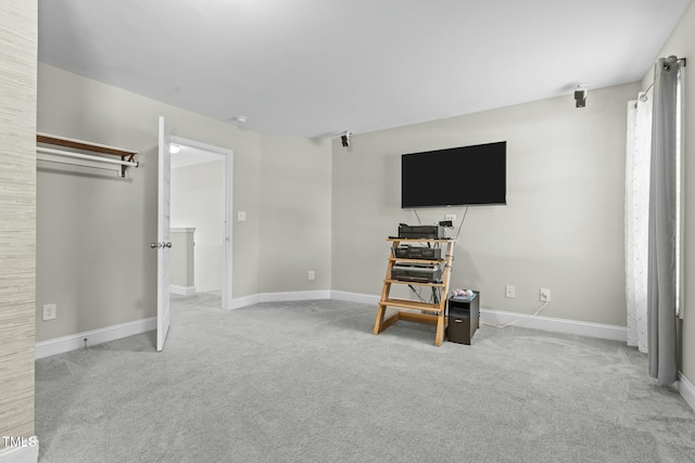 bedroom with light colored carpet