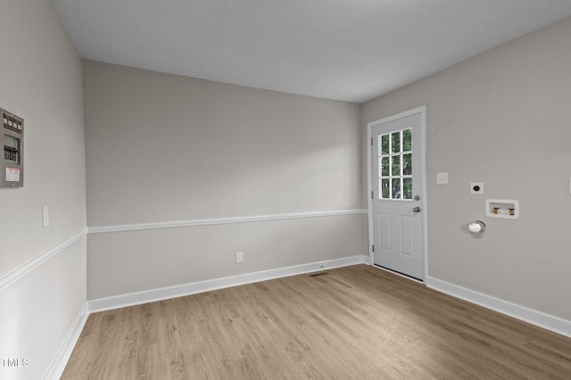 unfurnished room featuring light wood-type flooring