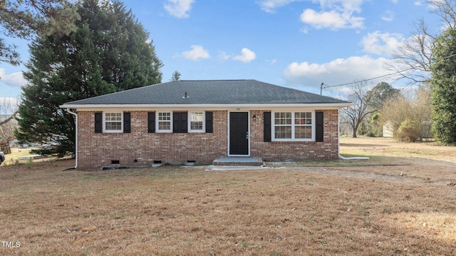 ranch-style house featuring a front yard